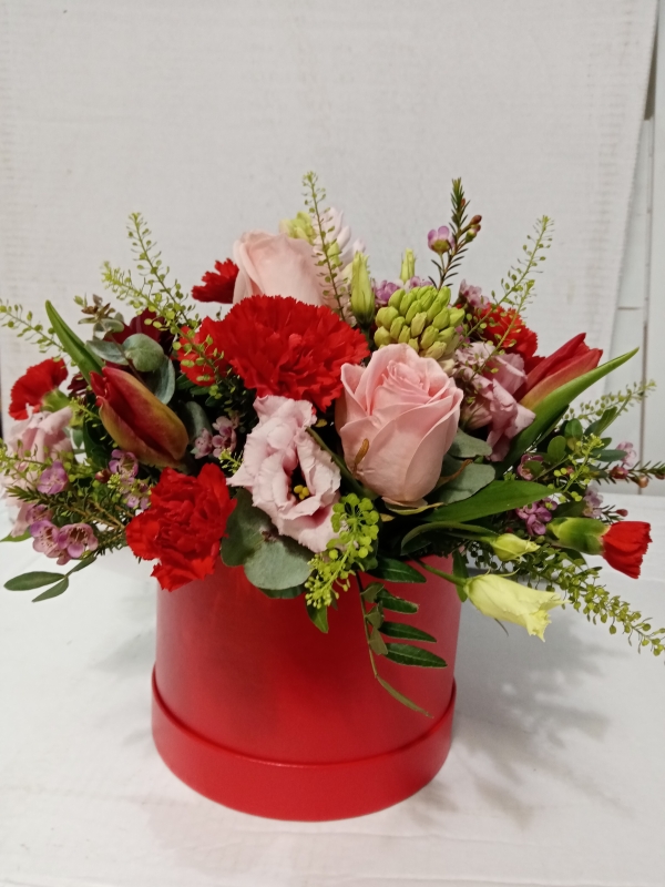 Ruby red hat box buy online or call 01775 233333